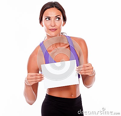 Healthy smiling brunette with blank signboard Stock Photo