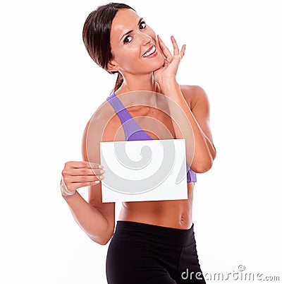 Healthy smiling brunette with blank signboard Stock Photo