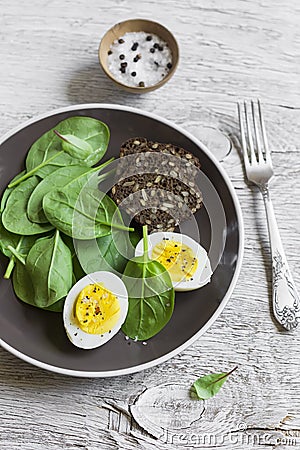 Healthy snack - fresh spinach and egg Stock Photo