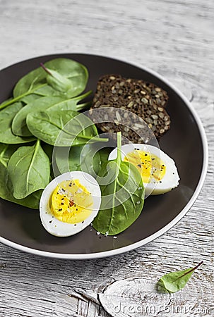 Healthy snack - fresh spinach and egg Stock Photo