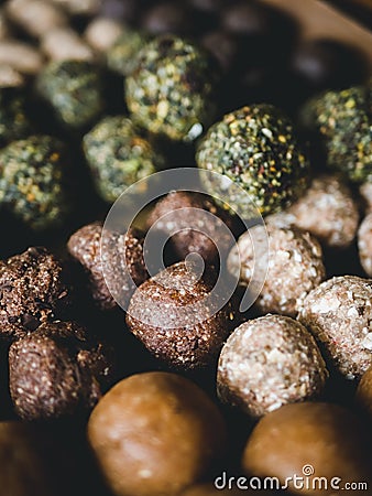 Healthy Dates oatmeal energy balls with green tea, Cocoa, Nuts. Stock Photo