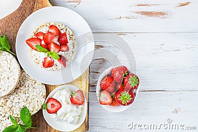 Healthy Snack from Rice Cakes with Ricotta and Strawberries Stock Photo