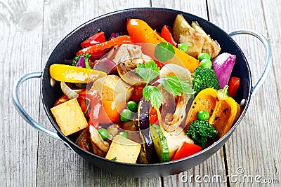 Healthy snack of roast vegetables and tofu Stock Photo