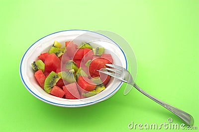 A healthy snack served in a bowl of chopped fruit Stock Photo