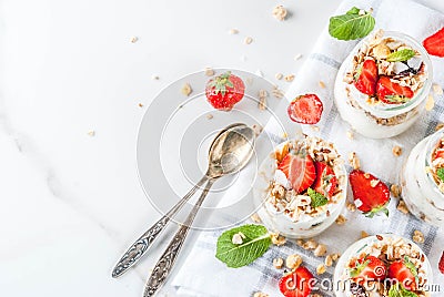 Healthy summer breakfast idea, homemade layered parfe dessert in Stock Photo