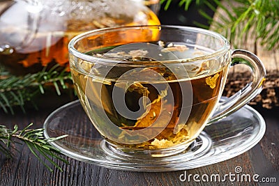 Healthy Tea with fresh herbs on rural table Stock Photo