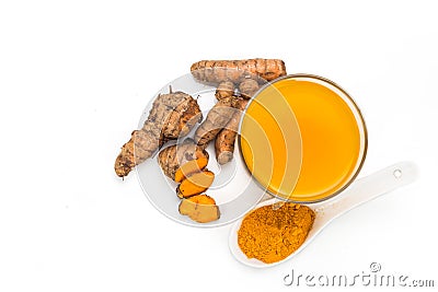 Healthy turmeric roots drinks in a transparent glass. Stock Photo