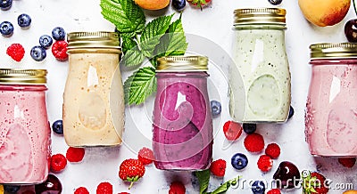 Healthy and useful colorful berry cokctalis, smoothies and milks Stock Photo