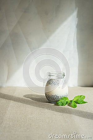 Healthy vanilla hemp pudding in a glass with fresh berries Stock Photo