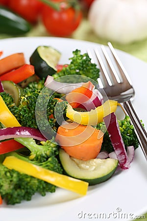 Healthy vegan eating vegetables food on plate Stock Photo