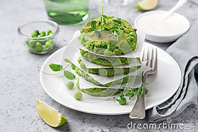 Healthy vegan green peas fritters Stock Photo