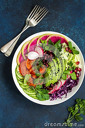 Healthy vegan lunch bowl salad. Avocado, red bean, tomato, cucu Stock Photo