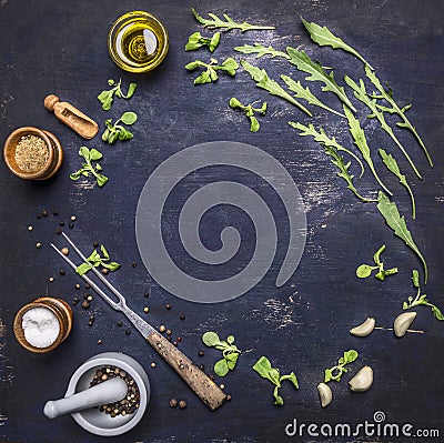 Healthy vegetarian foods, herbs and vegetables lined frame with spices place for text wooden rustic background top view close u Stock Photo