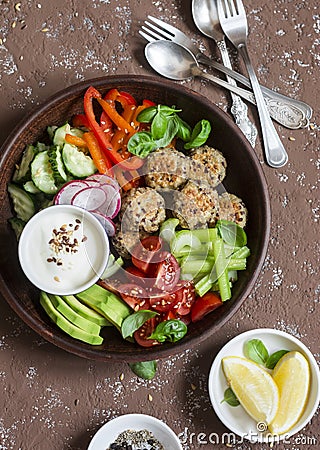 Healthy vegetarian snack set - quinoa meatballs and fresh raw vegetables on wooden table Stock Photo