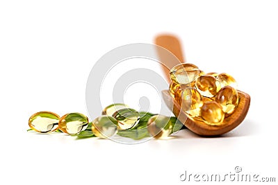 Healthy Vitamins, Omega 3,isolated and spoon closeup Stock Photo