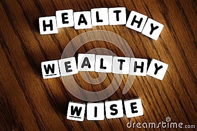 Healthy Wealthy and Wise Words Spelled with Letters Motivation for Improving Stock Photo