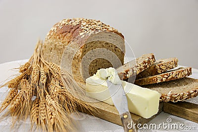 Healthy whole grain bread with butter Stock Photo