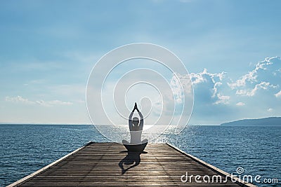 Healthy woman lifestyle balanced practicing meditate and zen energy yoga on outdoors the bridge in morning. Stock Photo