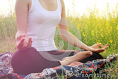 Healthy woman meditation field. Stock Photo