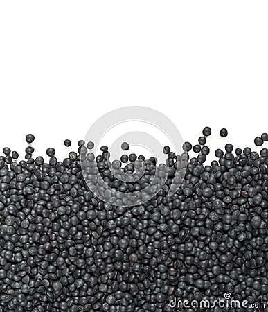 Heap of black organic beluga lentils border texture on white Stock Photo