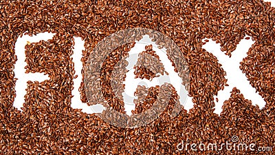 Heap of brown flax seeds isolated on white background with a white word flax Stock Photo