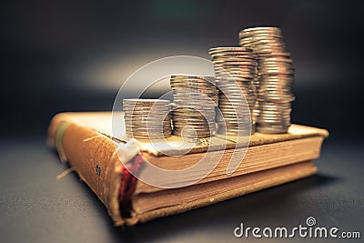 Heap Coins on the Old Novel Stock Photo