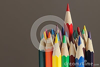 Heap of colored pencils, dark background Stock Photo