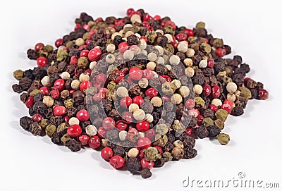 Heap of colored pepper on a white Stock Photo