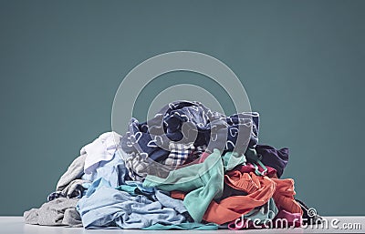 Heap of crumpled dirty clothes Stock Photo