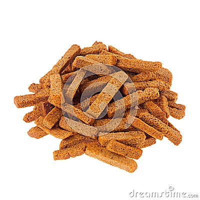 Heap crunchy brown rye sticks croutons isolated on white background. Stock Photo