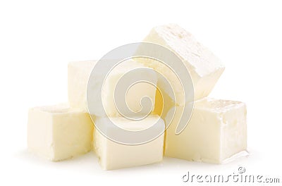 Heap of diced feta cheese on a white plate. Isolated Stock Photo