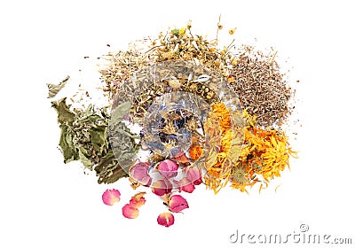 Heap of different aromatic dried herbs and flowers on white background Stock Photo