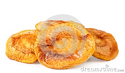 Heap of dried peaches on a white, isolated. Stock Photo