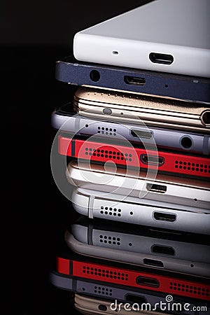 Heap of electronical devices close up - smartphones Stock Photo