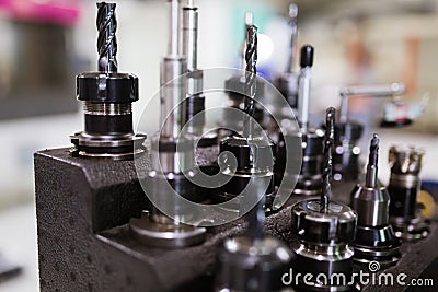 Heap of finished metal drill tools with protective coating Stock Photo