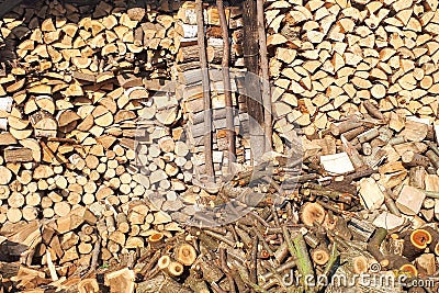 Heap firewood stack, natural wood for winter. Many wood fuel for winter. No smoking with wood Stock Photo