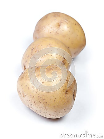 Heap of flawed natural potatoes Stock Photo