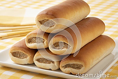 Heap of fresh baked sausage rolls close up for a snack Stock Photo