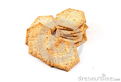 Hexagon shape organic wholemeal crackers on white background. Stock Photo