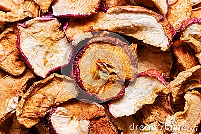 Heap of organic sun dried fruits dehydrated apples slices. Healthy diet wholefoods vegan winter beverages ingredients concept Stock Photo