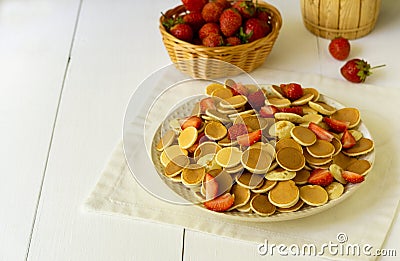 Heap of pancakes cereal with strawberry Stock Photo