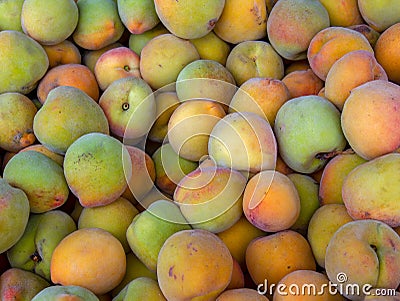 Heap of peaches in a market Stock Photo