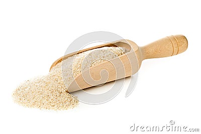 Heap of psyllium husk also called isabgol in wooden scoop over white background Stock Photo