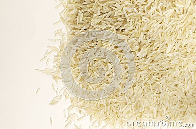 A heap of raw basmati rice. Concept of Water-Conserving Products. Saving water. Stock Photo