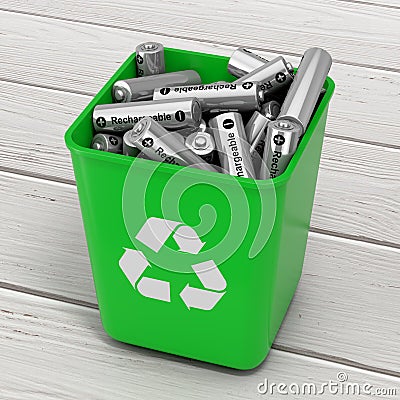 Heap of Rechargeable Batteries in Green Bucket with Recycle Sign Stock Photo