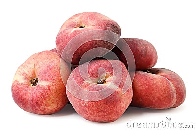 Heap of ripe peaches on a white background. Isolated Stock Photo