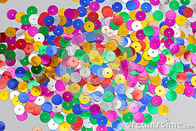 heap of round confetti on white surface Stock Photo