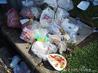 Heap of rubbish on grass Editorial Stock Photo