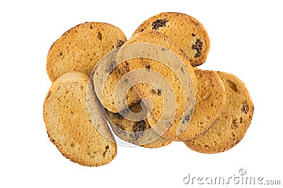Heap of small rusks with raisin isolated on white background Stock Photo