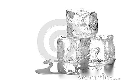 Heap of three melting ice cubes with water and reflection Stock Photo